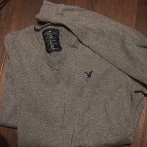 Men’s v- neck long sleeve sweater.